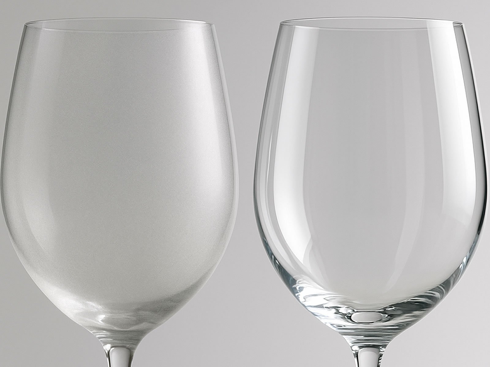 Side-by-side comparison of etched versus clear wine glasses